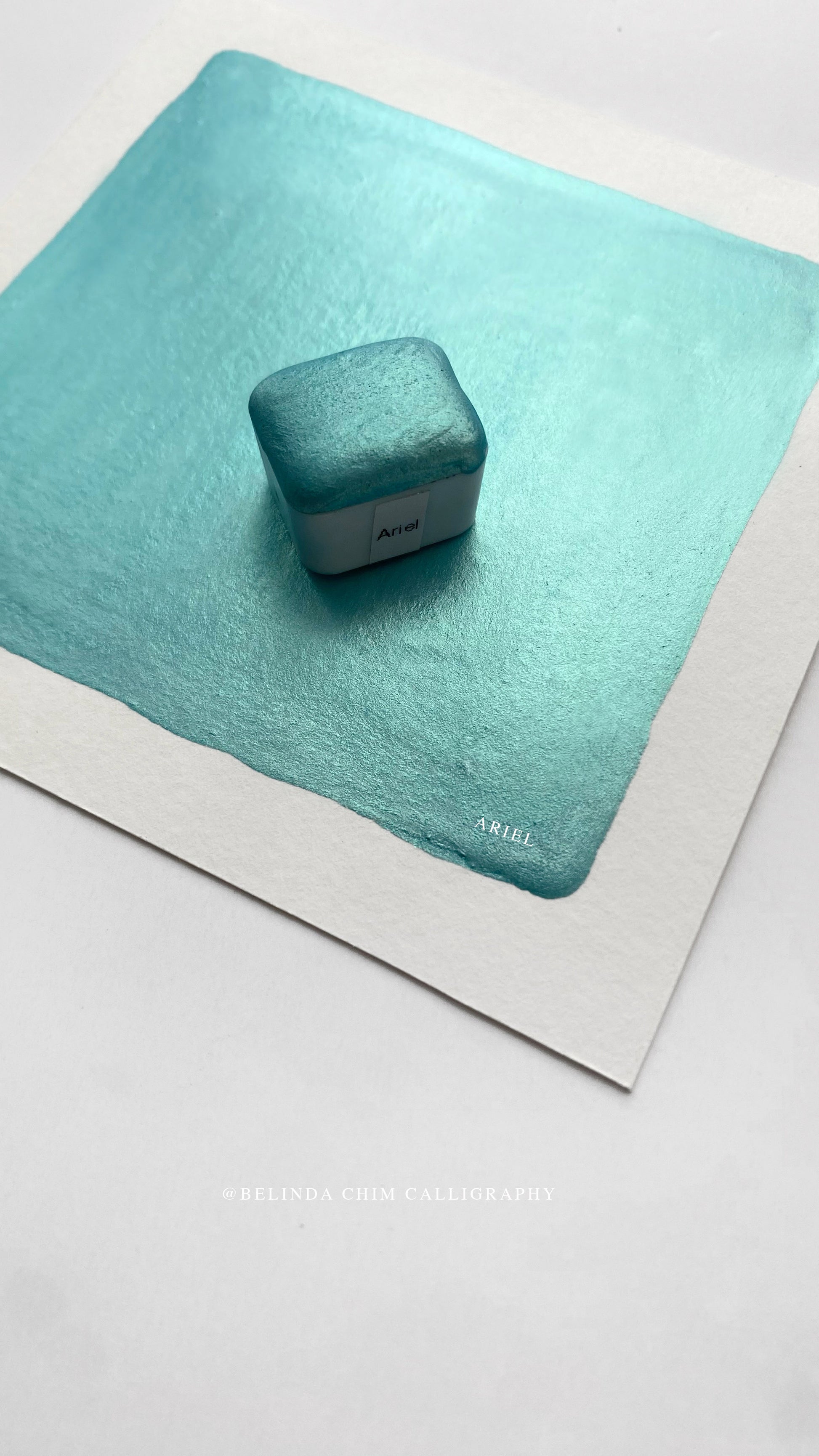 Homemade metallic watercolor in blue