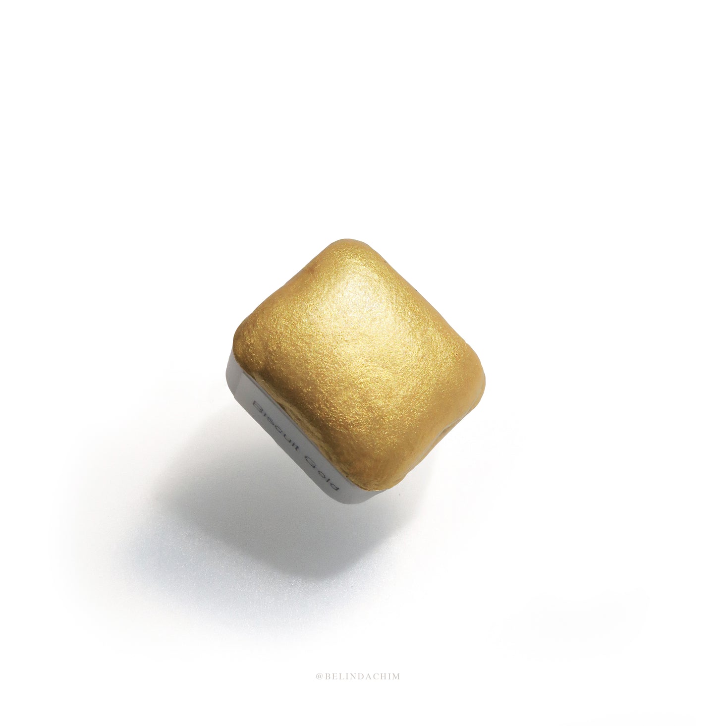 Homemade metallic watercolor in gold