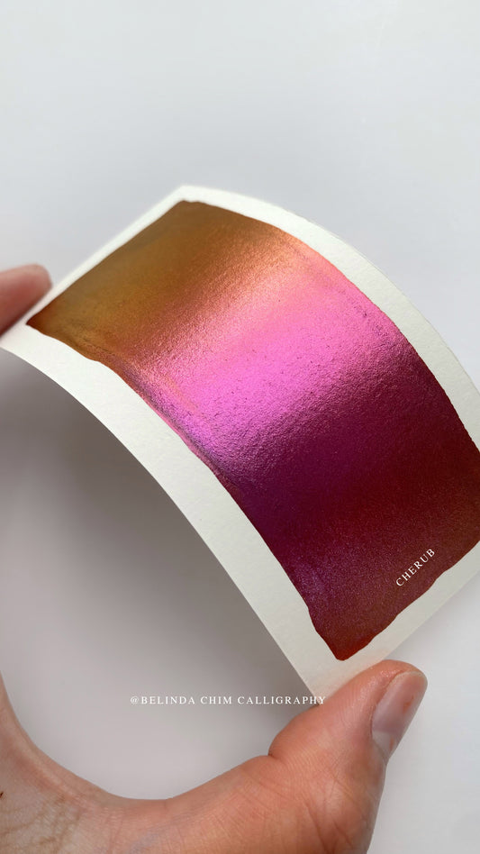Homemade colorshift metallic watercolor in orange and red