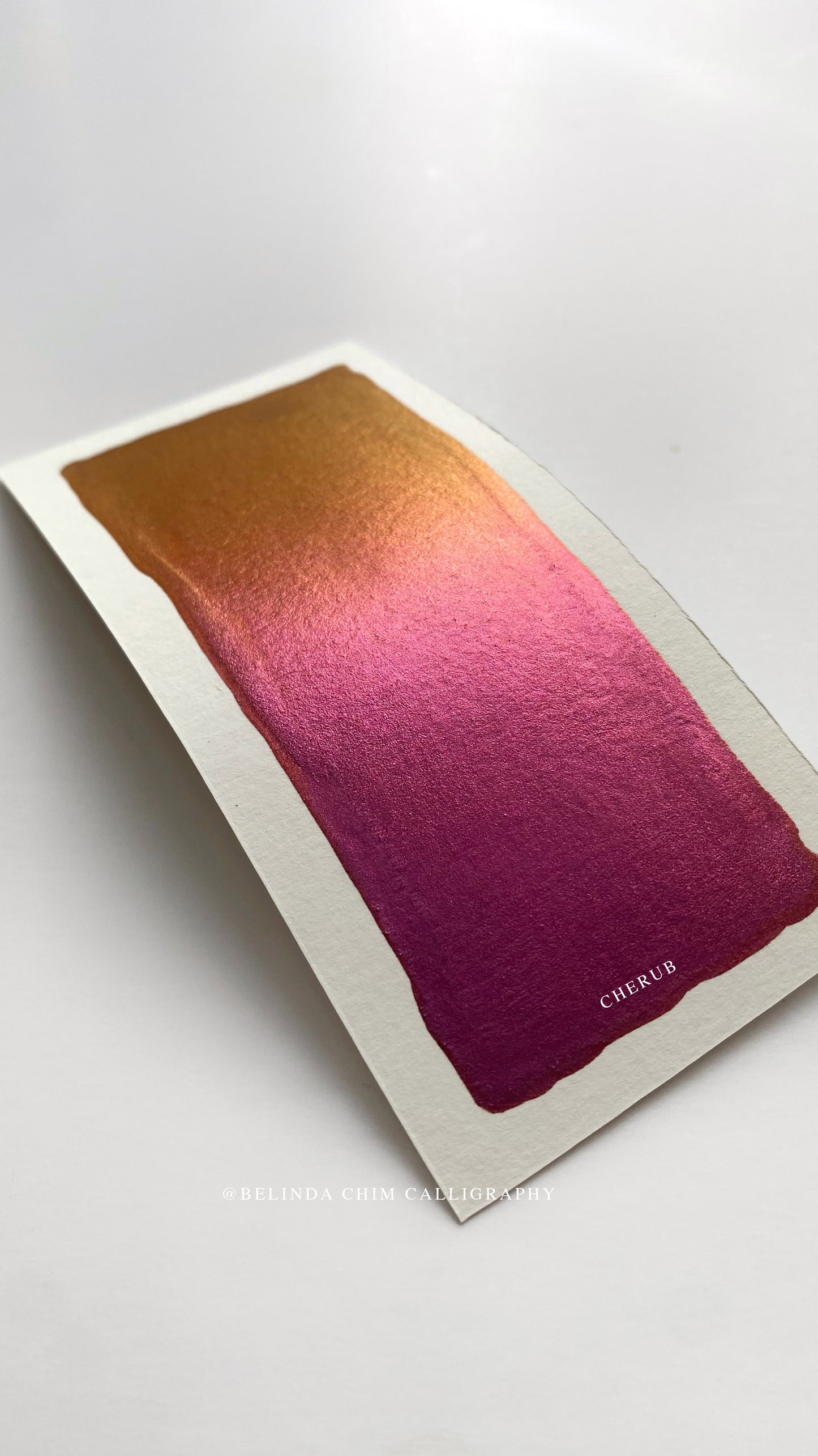Homemade colorshift metallic watercolor in orange and red