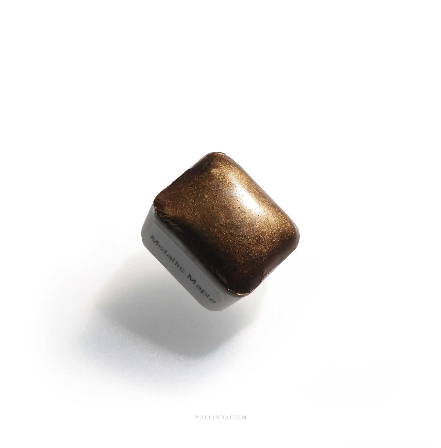 Homemade metallic watercolor in brown