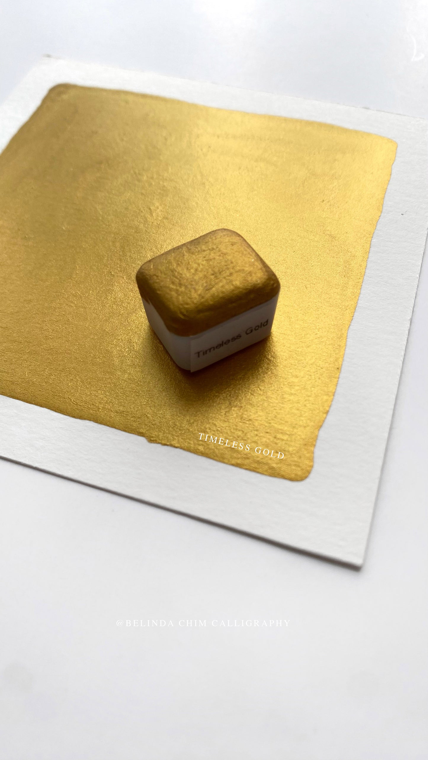 Homemade metallic watercolor in gold