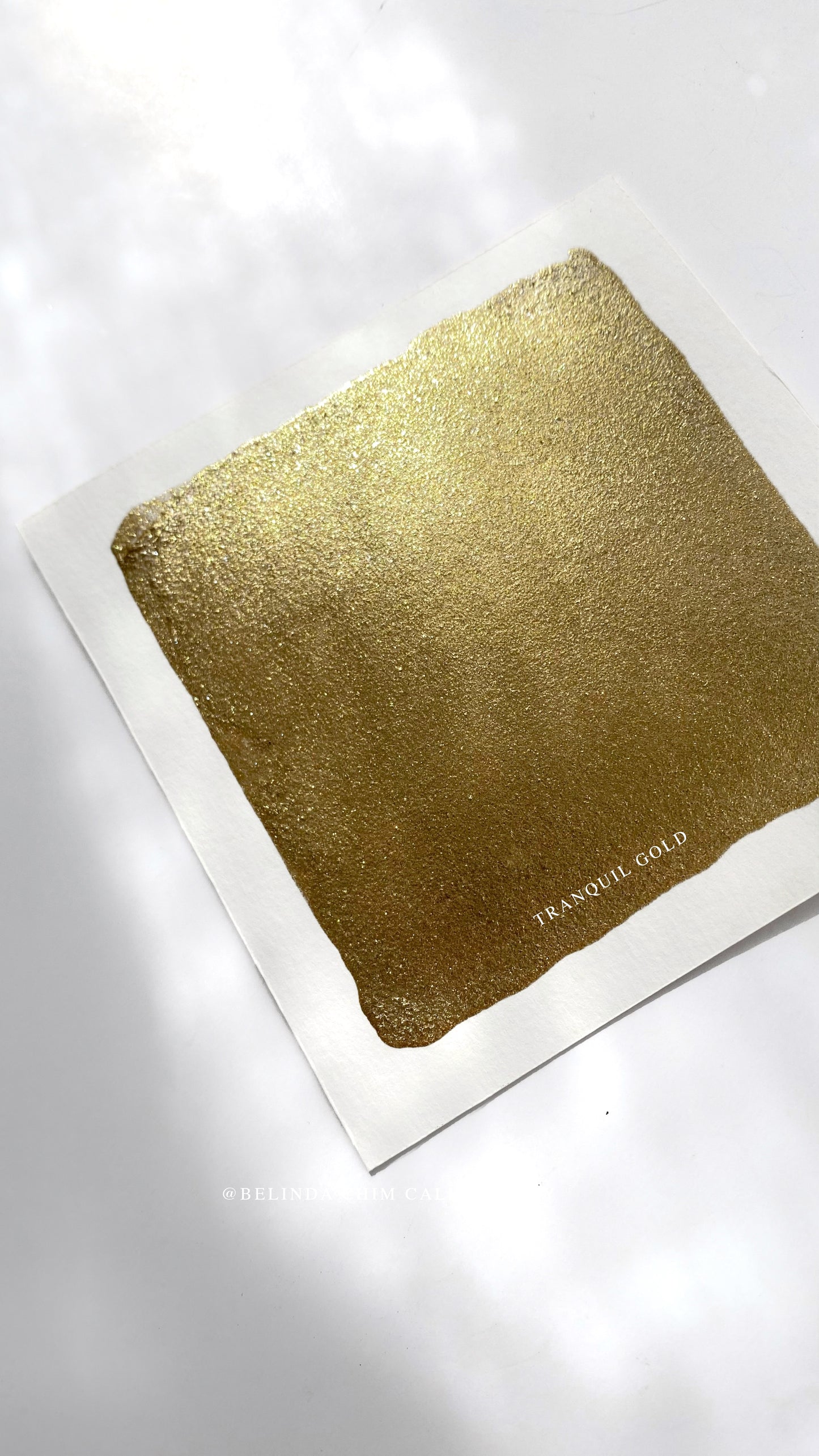 Homemade metallic watercolor in gold