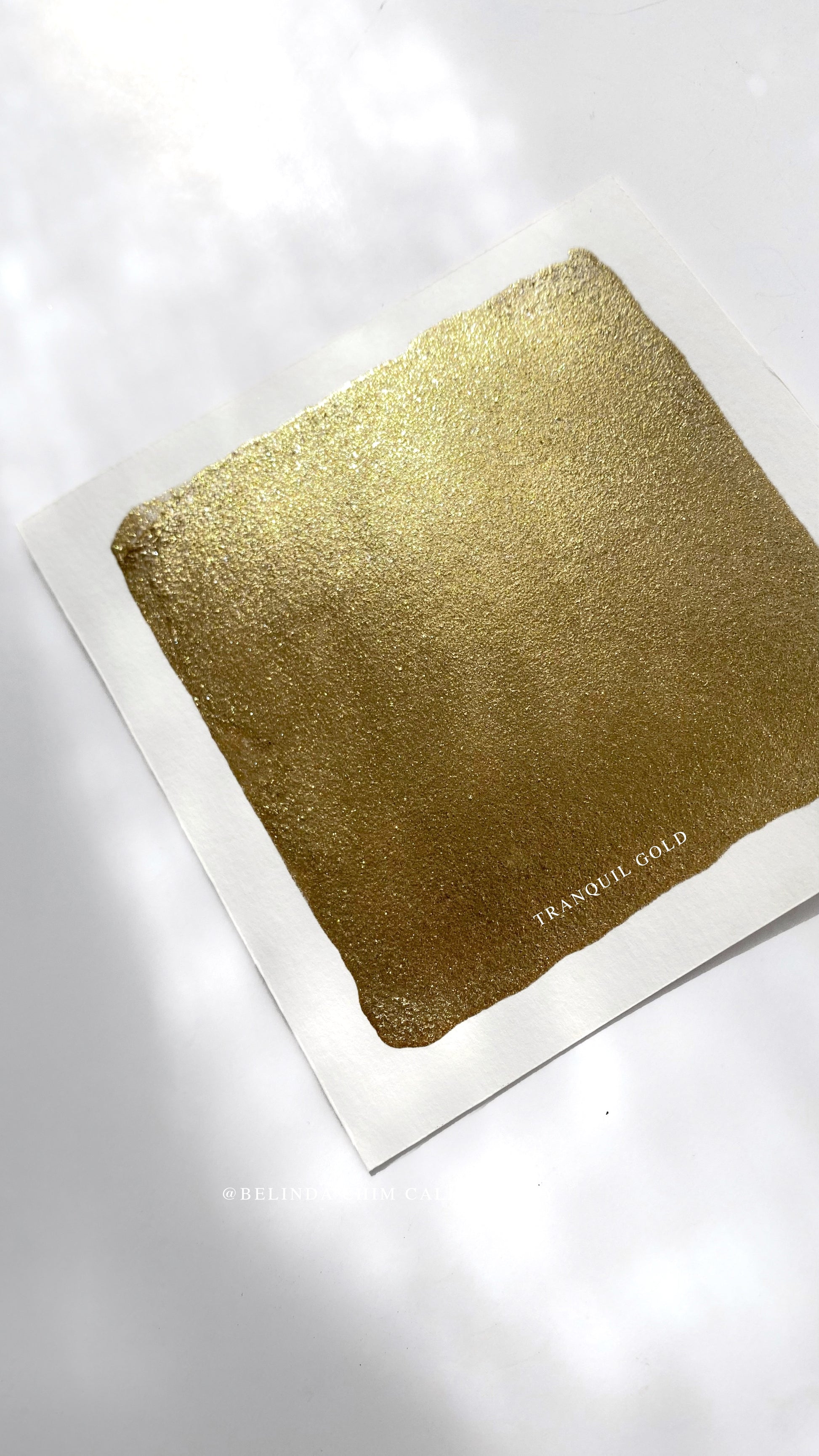 Homemade metallic watercolor in gold