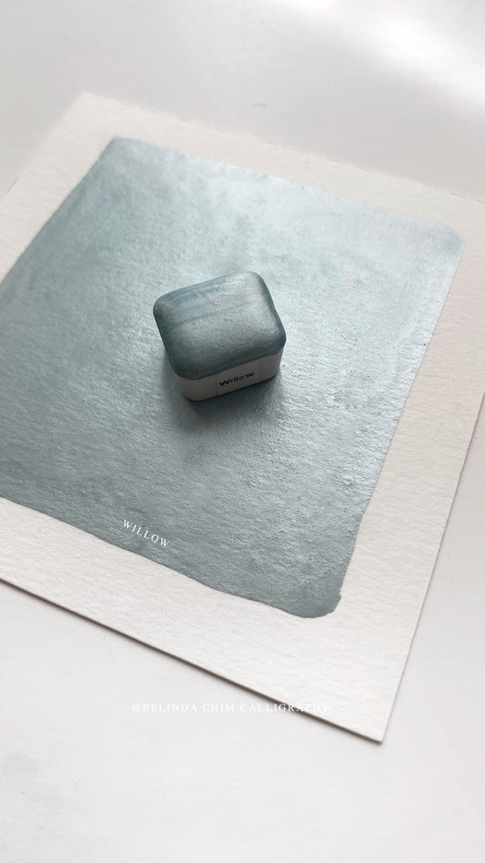 Homemade metallic watercolor in blue
