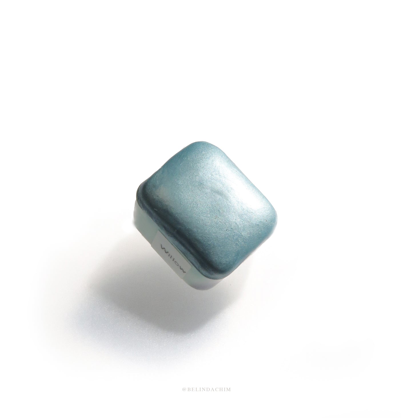 Homemade metallic watercolor in blue